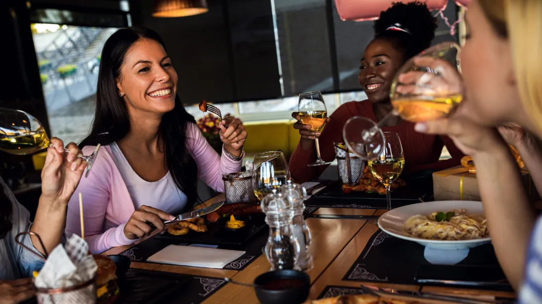 Restaurant with customers celebrating